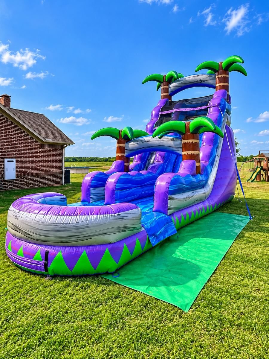 18 foot tropical purple and blue water slide set up in a backyard